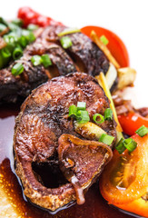 Malaysian dish deep fried mackerel tuna fish with soy sauce