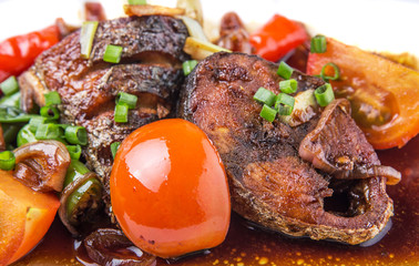 Malaysian dish deep fried mackerel tuna fish with soy sauce