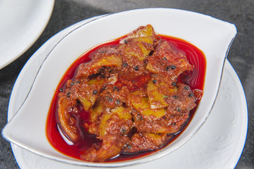 Bowl of spicy chili potato salsa dip