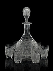 Cut crystal decanter and six piles