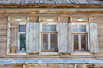 Obraz na płótnie Canvas Three old russian style wooden window in Astrakhan, Russia