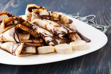Crepes with banana and chocolate cream