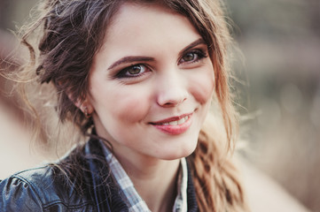 Obraz premium outdoor close up portrait of young happy beautiful woman