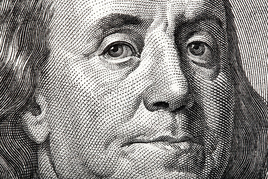 Portrait Of Ben Franklin On The US $100 Dollar Bill In Macro.