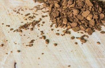 Instant coffee on a wooden background