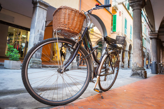 Old fashion bicycle on the street of Pisa, Italy
