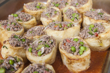 Roasted stuffed potaoes at an oriental restaurant buffet