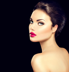 Beauty woman face closeup isolated on black background © Subbotina Anna