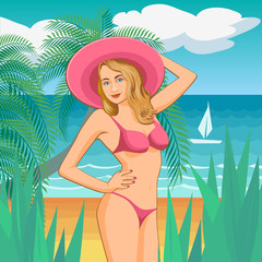 Girl sunbathes on a beach in a pink bikini