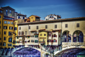 Fototapeta na wymiar historic buildings over Arno river