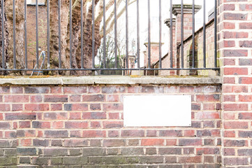 Blank white plate mounted on a street corner