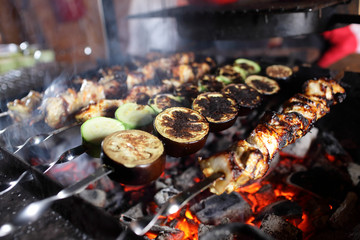 Cooking of kebab on skewers