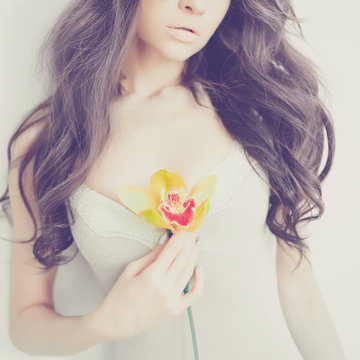 Beautiful lady with orchid