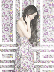 Fototapeta premium Sensual woman on floral background