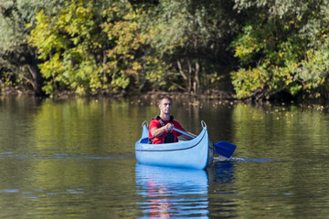Young man in canoe