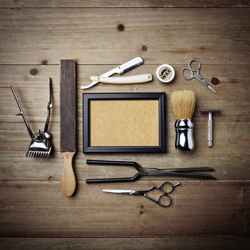 Set of vintage barber shop tools with picture frame