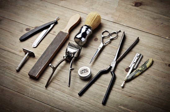 Vintage tools of barber shop on wood desk
