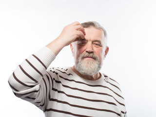 Obraz premium Old man with a beard retired depressed