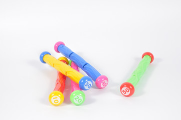 Colorful diving sticks for playing in pool, summer sports and ga