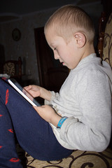 Fototapeta na wymiar Boy with tablet
