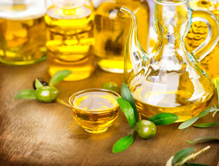 Olives and olive oil. Bottle of virgin olive oil