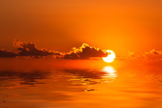 Sunset with reflection in sea