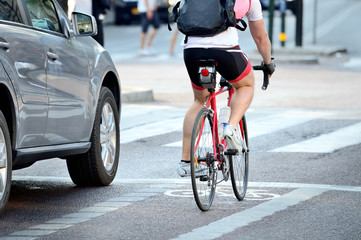 Rear view of bicyclist in full gear