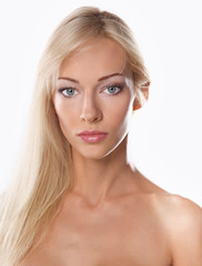 Close up portrait of beautiful young woman face. Isolated on