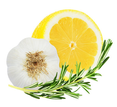 Lemon with rosemary and garlic isolated on white background