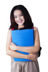 Modern college student smiling in studio