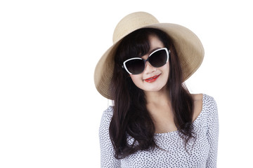 Fototapeta premium Woman wearing a hat in studio