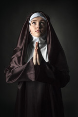 portrait of young beautiful woman nun