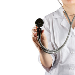 Female doctor's hand holding stethoscope isolated on white backg