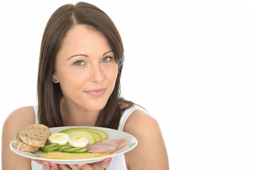 Healthy Happy Young Woman Holding a Plate of Norwegian Breakfast