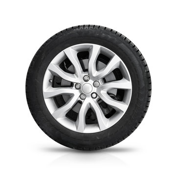 Automotive wheel on gray light alloy disc isolated