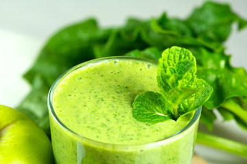 Healthy green vegetable  smoothie with apples,spinach,cucumber,l