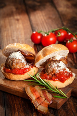 Meatball sandwich with tomato and parmesan