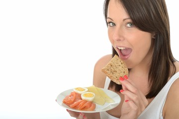Happy Young Woman Holding a Plate of Norwegian Style Breakfast