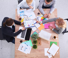 Group of business people working together in office