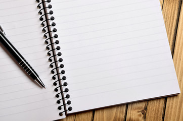 Blank paper with pen