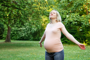 Pregnant woman in the park