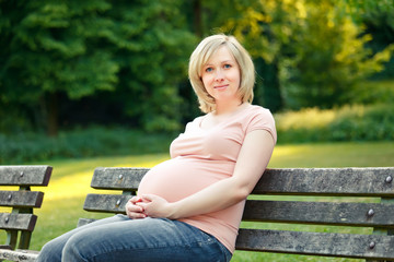 Pregnant woman in the park
