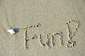 Fun word written on the sand
