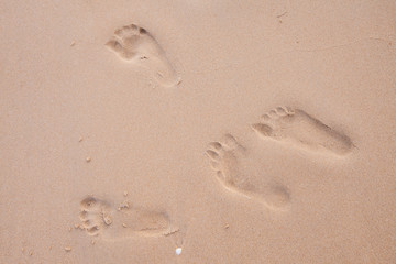 Fototapeta na wymiar Footprints on the beach.
