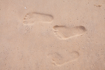 Fototapeta na wymiar Footprints on the beach.