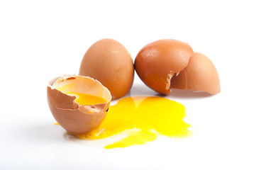 Broken egg isolated on white background