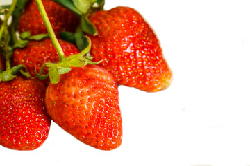 Strawberry berries on a white background.