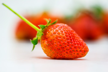 Strawberry berries on a white background.
