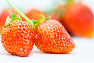 Strawberry berries on a white background.