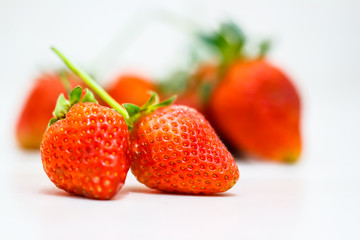 Strawberry berries on a white background.